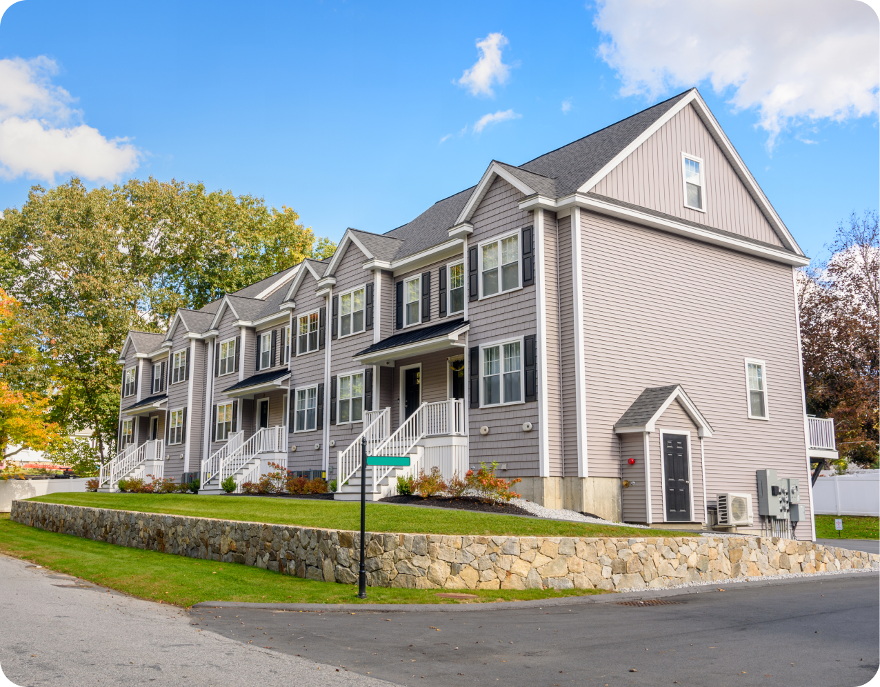 Gray townhouse on a sunny day